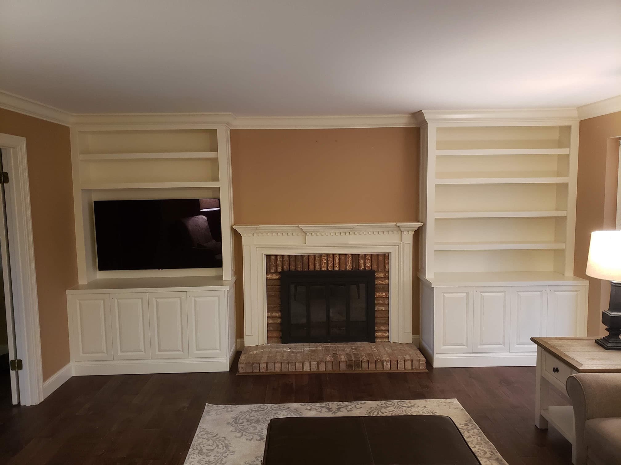Custom media center with fireplace integration - Professional Wood Interiors - St. Louis, MO