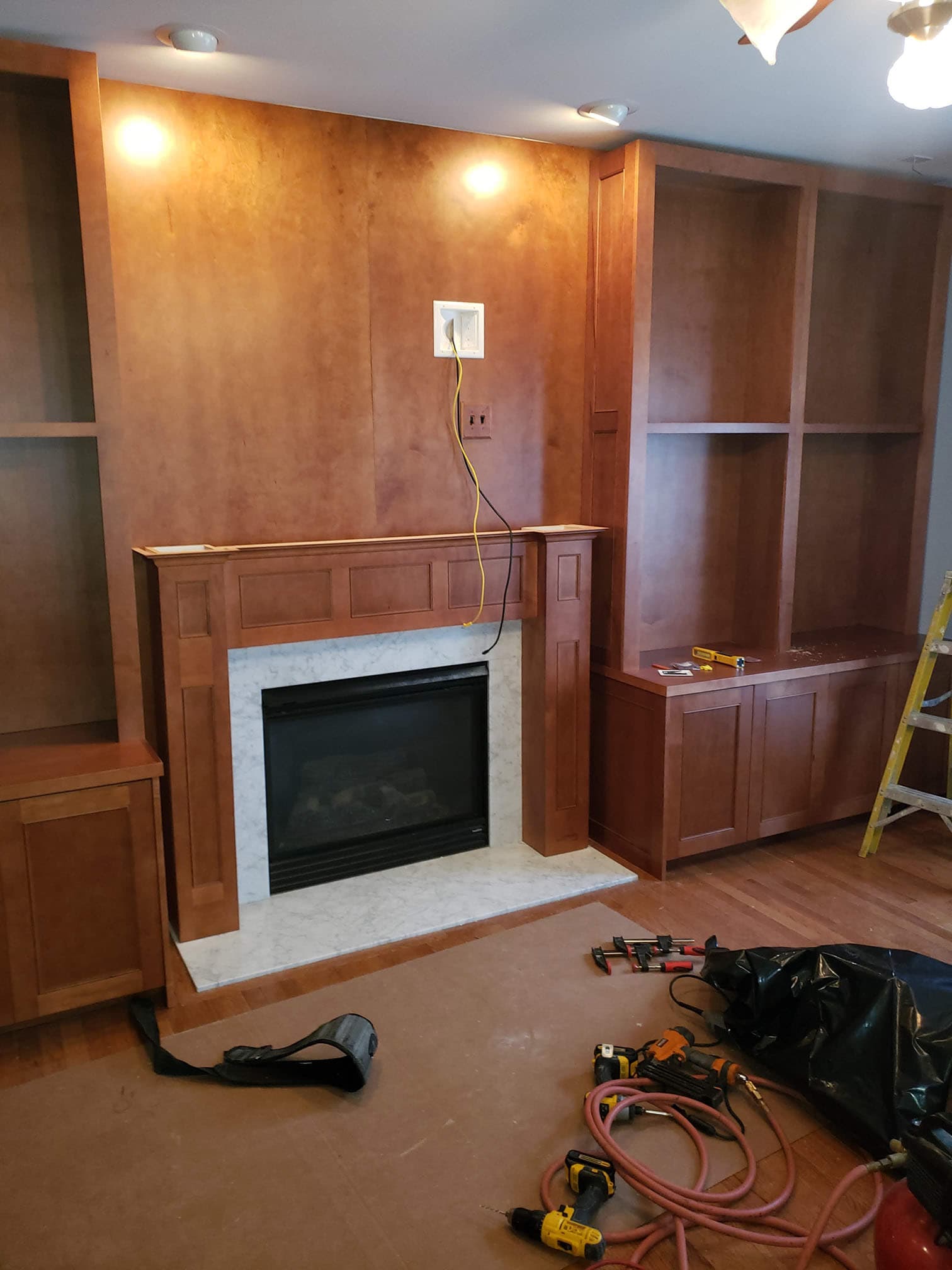 Built-in media center with solid wood construction by Professional Wood Interiors - St. Louis, MO