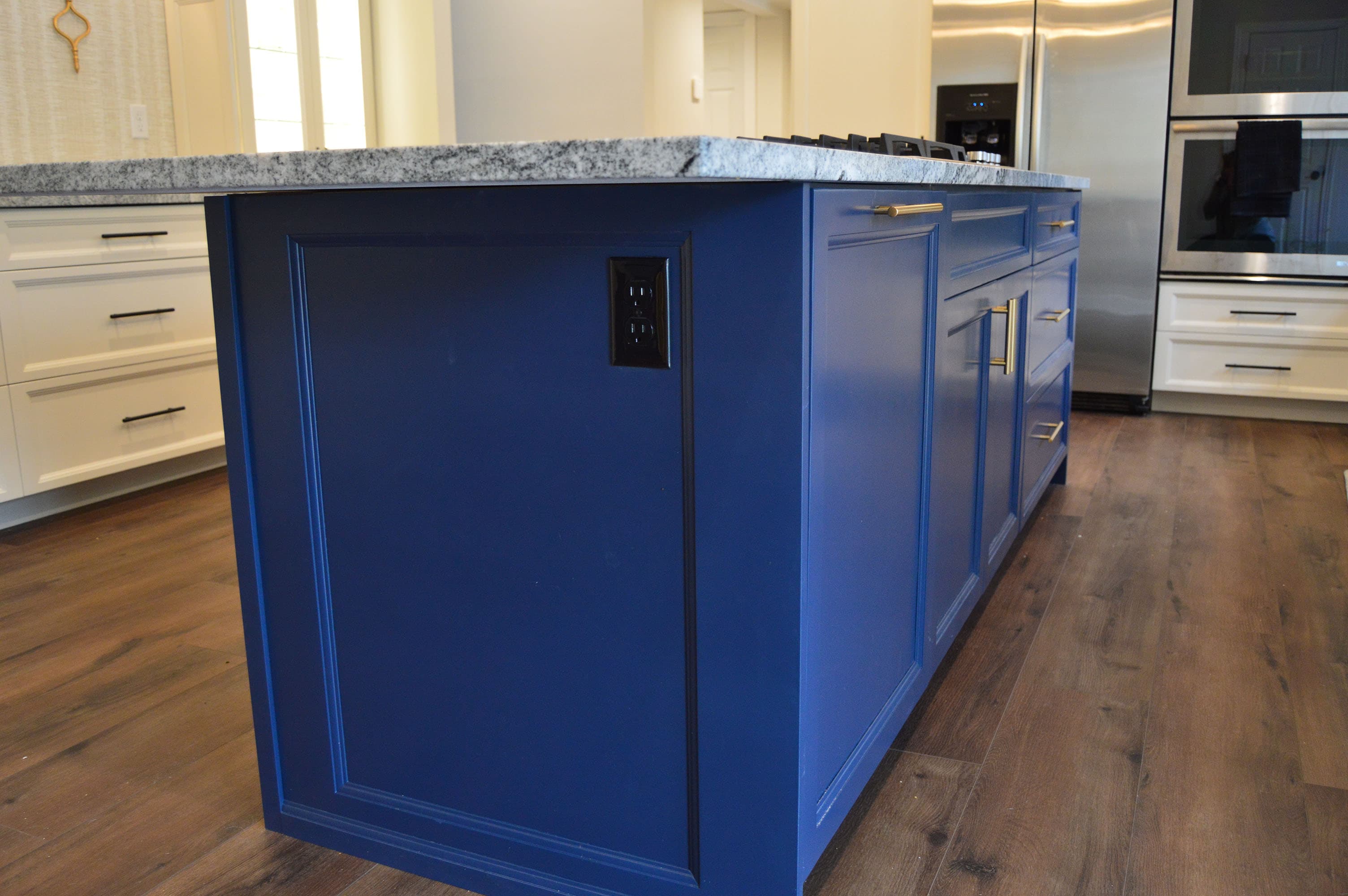 Custom kitchen with blue island cabinetry