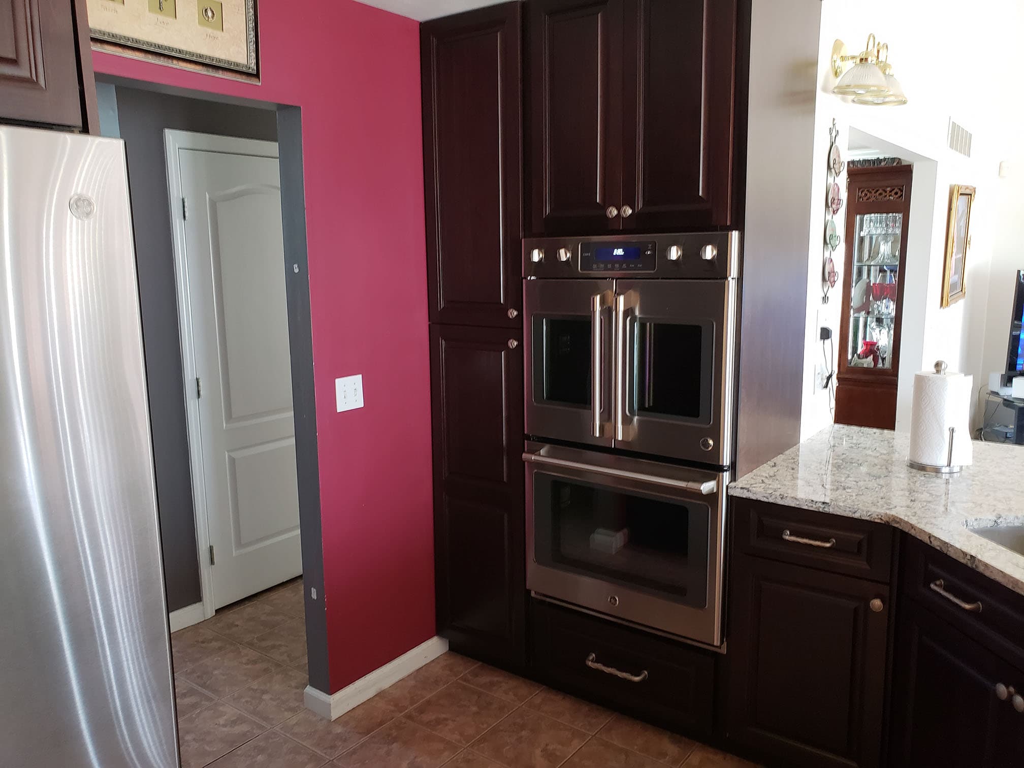 Custom darkwood kitchen cabinetry
