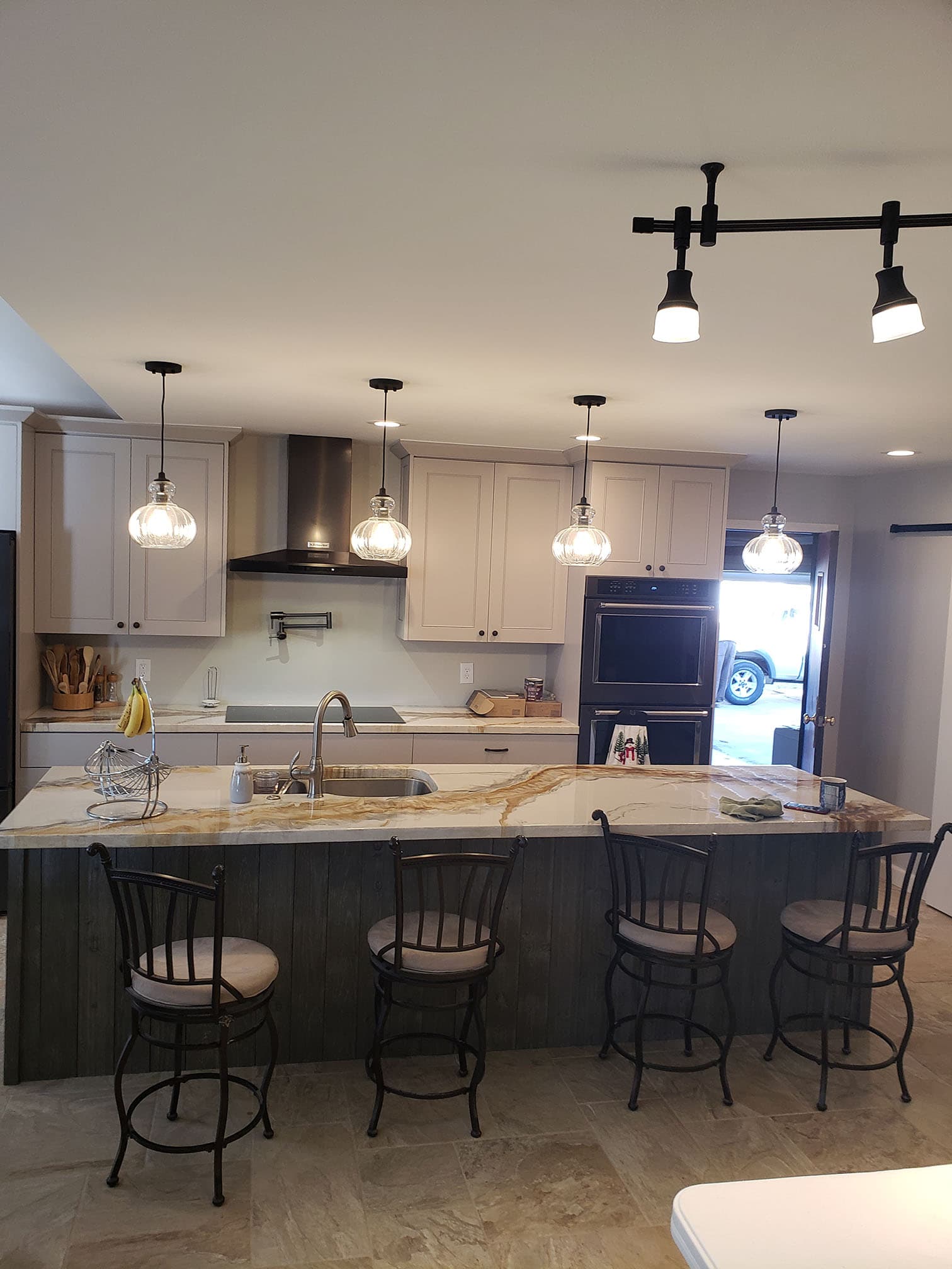 Quartzite Luxury Kitchen Custom kitchen remodel featuring white luxury kitchen remodel by Professional Wood Interiors - St. Louis, MO